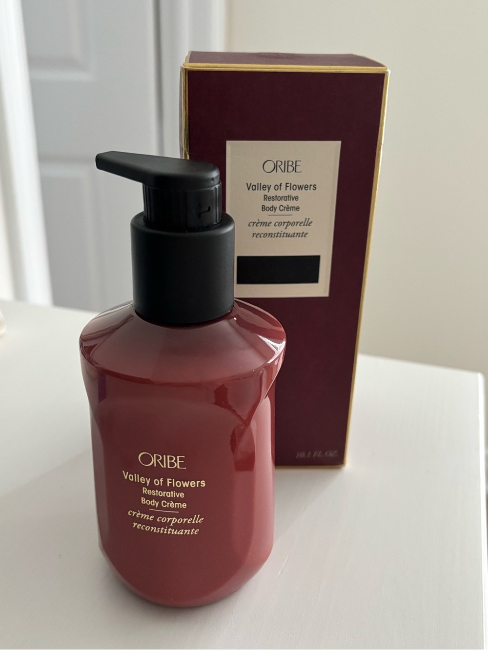 Oribe Valley of Flowers Restorative Body Crème — Deep Rose with Black Pump
